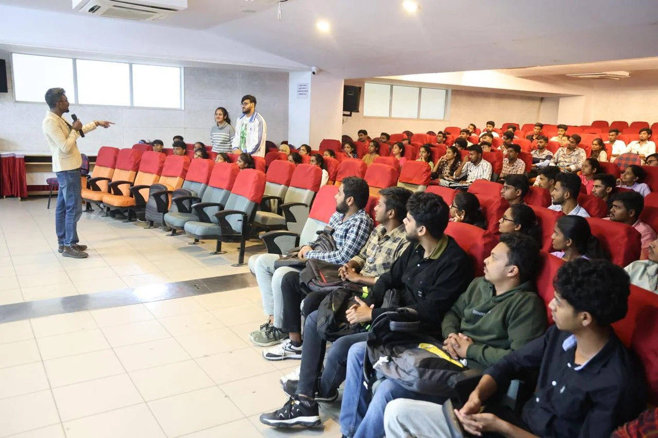 Aviation students seated in a lecture hall during a seminar