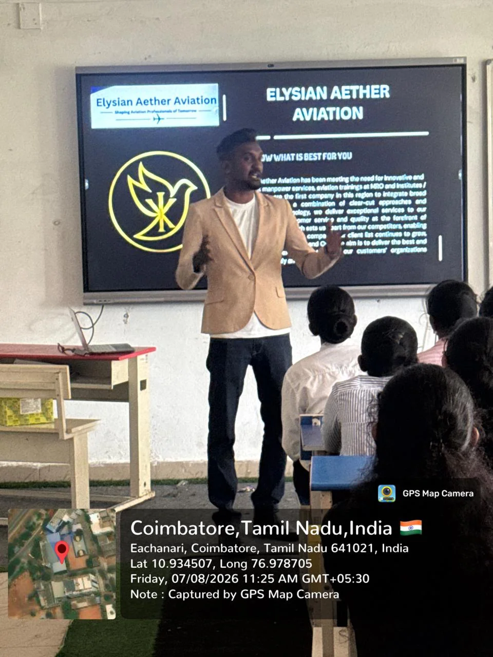 Instructor presenting aviation academy information to students