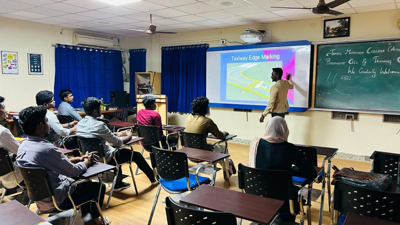 Instructor teaching airport taxiway markings in a classroom